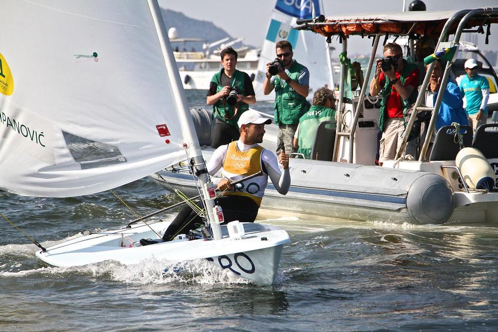 Tonci Stianovic (CRO) acknowledges the media after dropping back from Gold to a Silver medal in the Mens Laser - 2016 Olympic Regatta © Richard Gladwell www.photosport.co.nz